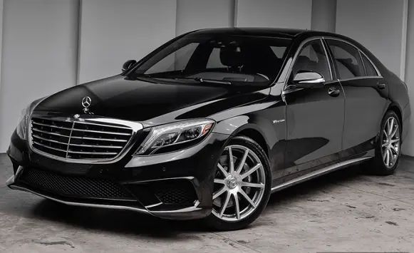 Black luxury sedan parked